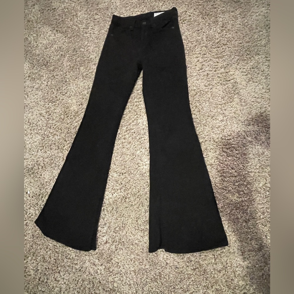 Black flare jeans, split hem